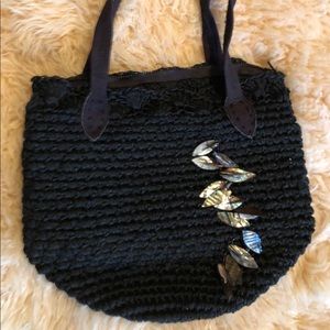 Handmade black bag with glass leaves in tan/gold